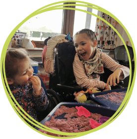 sisters in messy play